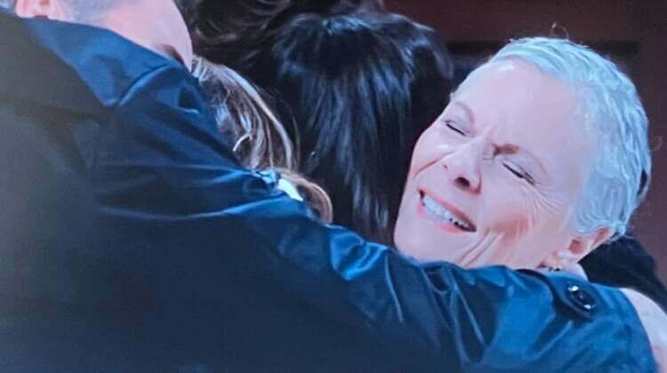 GH 2nd photo 8-11-25 sees Tracy Q at last reuniting with her whole family as they now able to move back to the Estate.